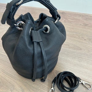 black leather bucket bag