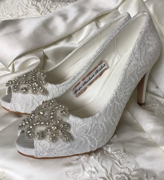 White bridal hotsell shoes with rhinestones
