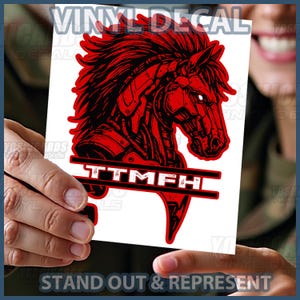 May include: Red and black vinyl decal featuring a mechanical horse head design. The decal includes the text "TTMFH" and the phrase "STAND OUT & REPRESENT". The design is on a white background.