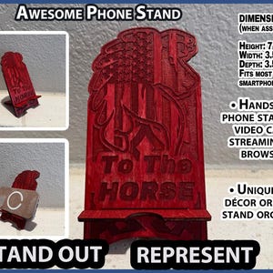 May include: Red wooden phone stand with an American flag design and the text "To The Horse." Dimensions: 7 inches high, 3.5 inches wide, and 3.5 inches deep. Features hands-free use for video calls and streaming. The stand is a unique desk décor.