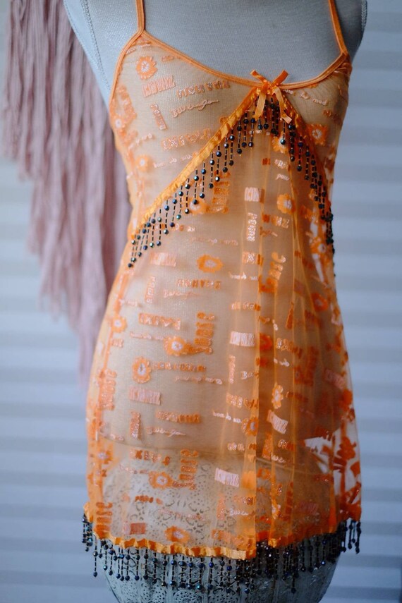 orange sheer top