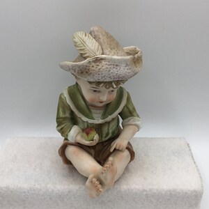 Vintage Piano Baby/Figurine - Unknown Maker
