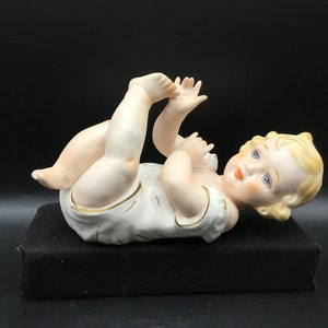 Vintage Large  Piano Baby Figurine - 9 Inches Long