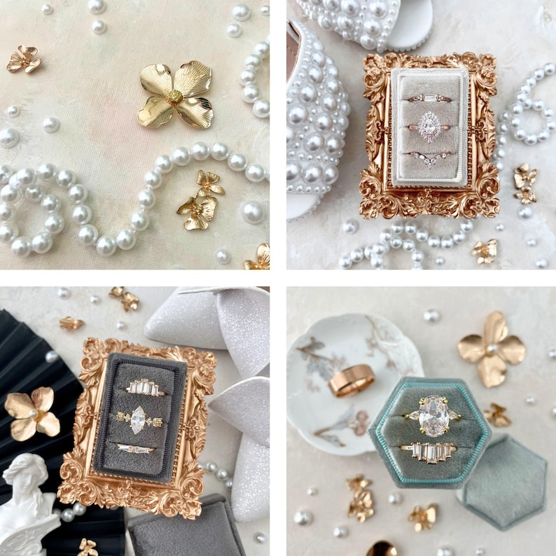 May include: A collection of wedding rings, gold floral decorations, and strings of pearls are arranged on a light-coloured surface. The rings are displayed in ornate, velvet-lined boxes. A pair of white, pearl-studded shoes is also visible.