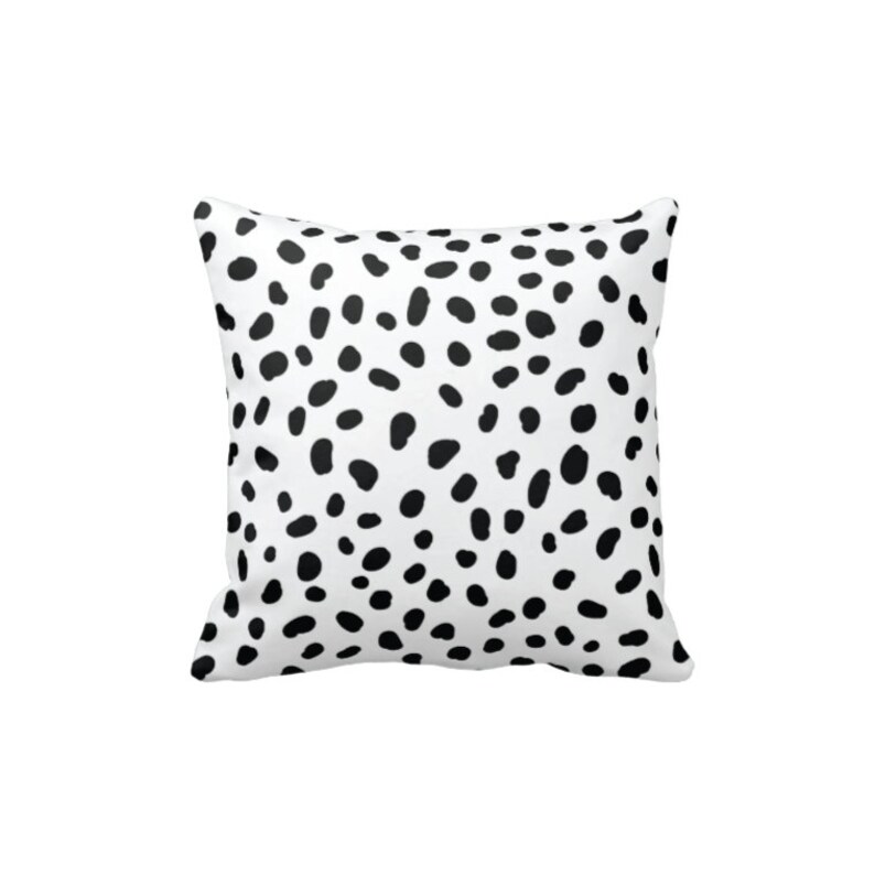 black and white spotted pillow