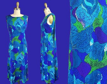 Vestido havaiano vintage dos anos 1960 - modelo maxi tiki em tecido de casca de árvore nas cores azul, roxo e verde com cauda. Cintura: 74 cm (29 polegadas).