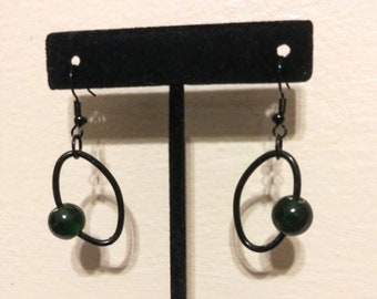 Black Metal Angled Oval Geometric Dangle Earrings with Dark Green Sphere Glass Bead