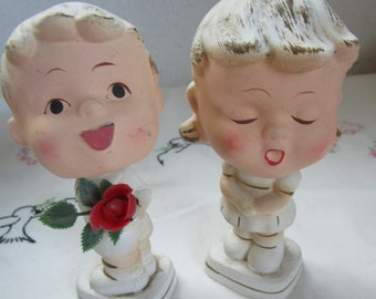 Vintage Enesco KISSING Bobble Head Plastic Rose Behind Back - BOY NODDER with girlfriend -Needs a little tlc -Estate find! Combined shipping