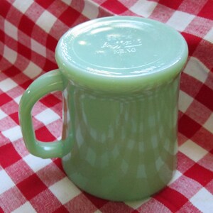 Vintage flat bottom Fire King Oven Ware Jadeite D handle mug is stamped on bottom coffee/shaving mug- no chips or cracks- Old mark!