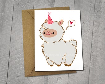 May include: A blank greeting card featuring a cartoon llama wearing a party hat and holding a heart-shaped balloon. The card is white with a brown outline and is paired with a brown envelope. The card measures 5x6.5 inches.