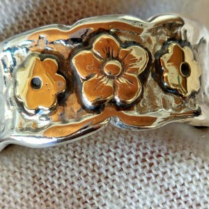 Band ring with 3 gold flowers silver ring  wedding ring Handmade by Designer Hedva Elany