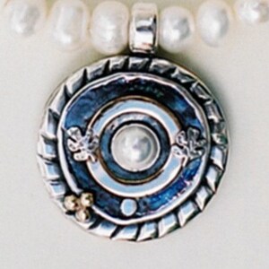 Pearls necklace, round silver and gold pendant set with a pearl, white necklace