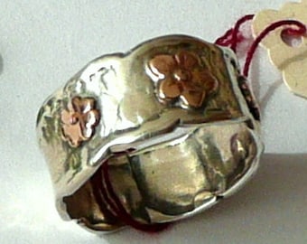 Band ring with 3 gold flowers silver ring  wedding ring Handmade by Designer Hedva Elany