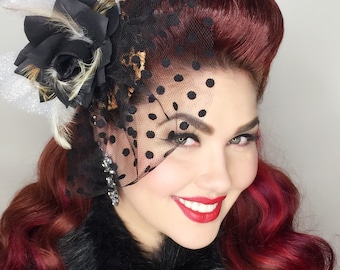 The Dita leopard fascinator