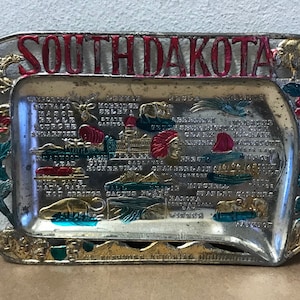 South Dakota souvenir tray pot metal vintage 1950s Japan tourist trap travel attractions landmarks places map art die cut gift shop embossed