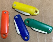 Tiny Jackknife charms vintage colorful novelty Hong Kong mini knives miniature toys 1970 39 s red blue green yellow cute plastic metal folders