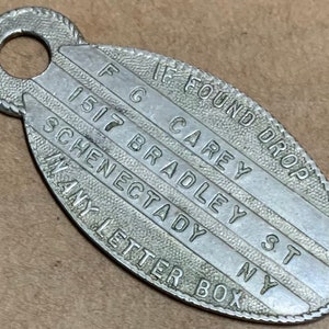Rare Antique Key ID Tag watch fob Schenectady NY If Found Drop in any Letter Box 1517 Bradley St FG Carey principios del 20 de 1900 níquel plata