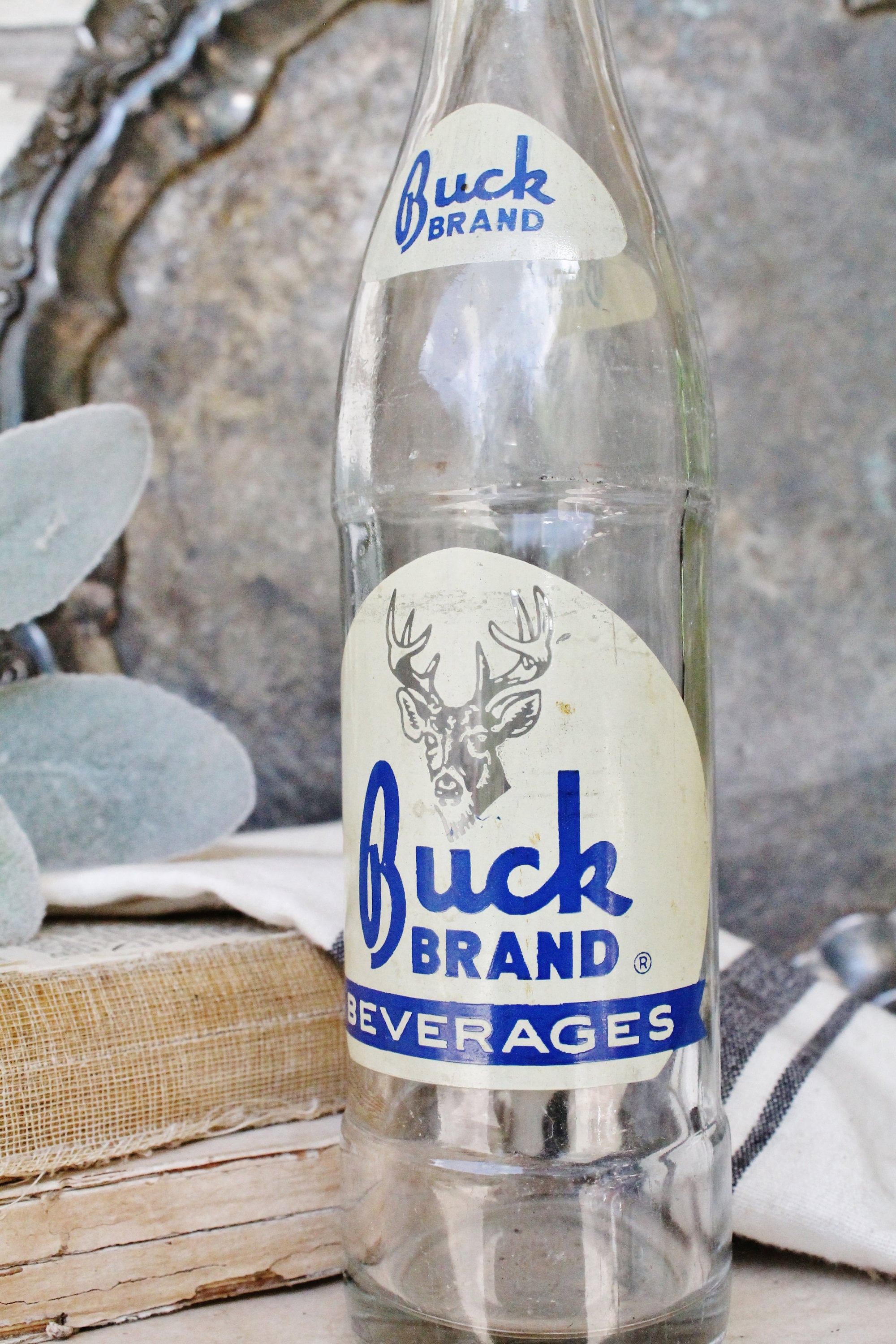 Vintage BUCK BRAND BEVERAGES Soda Bottle Texas Blue Deer Man Cave