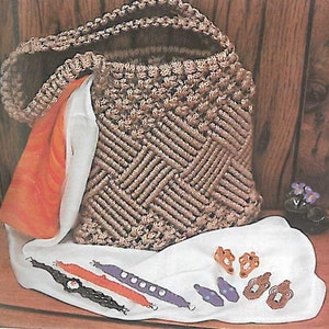 May include: A brown crocheted bag with a white fabric lining and a white fabric with colorful embellishments. The bag is made with a knotting technique.