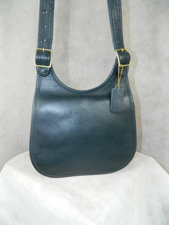 vintage coach saddle bag