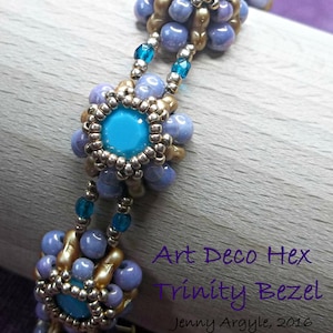 May include: A detailed shot of a beaded bracelet with a turquoise centre and a floral design. The bracelet features light blue and gold beads. Text reads "Art Deco Hex Trinity Bezel" and "Jenny Argyle, 2016".