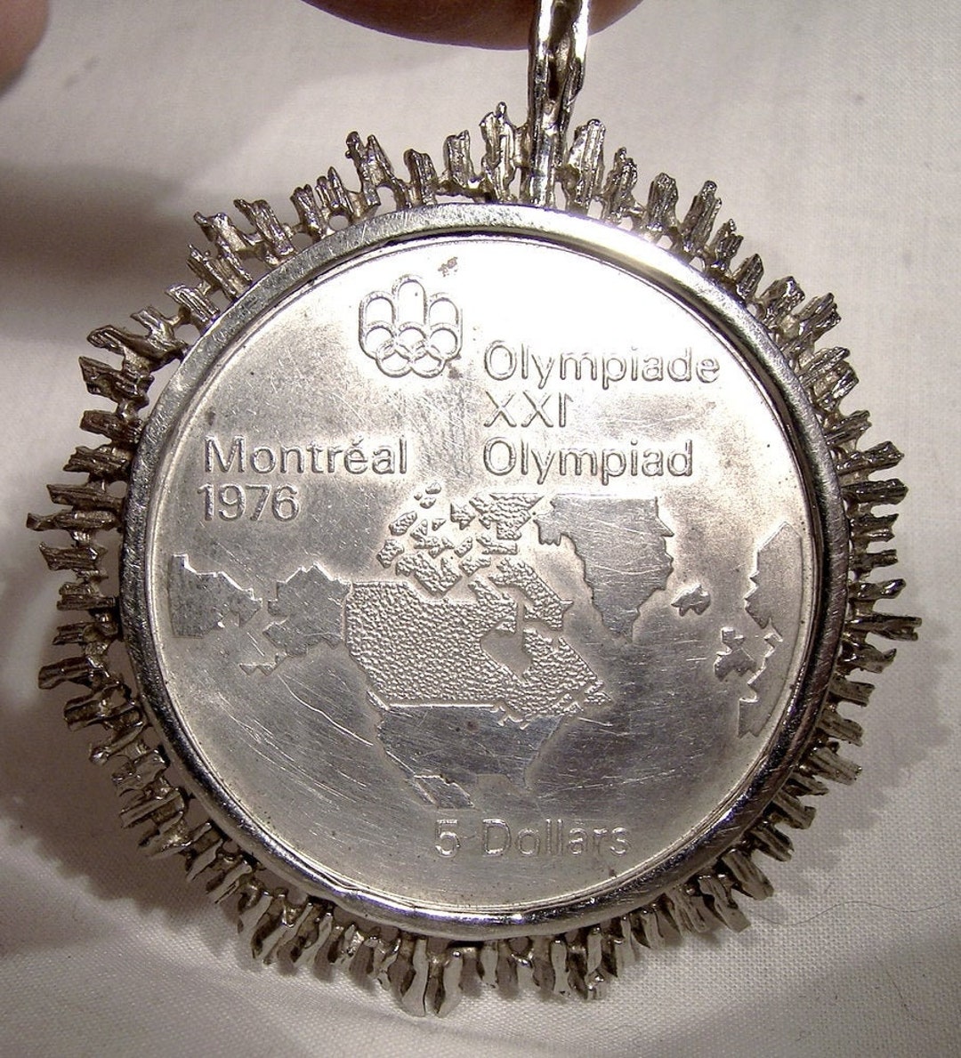 1976 Montreal Olympiad Olympics 5 Dollar Sterling Silver Coin in
