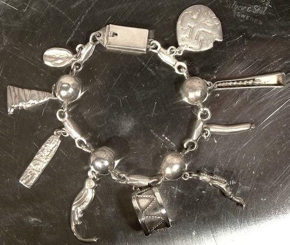 Mexican Sterling Silver CHARM BRACELET 1950s 9 Ch… - image 1