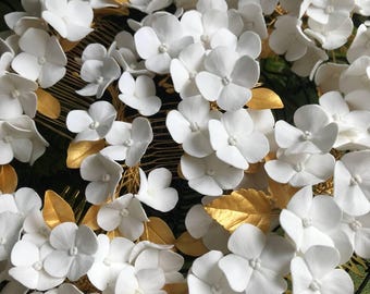 White hydrangea   hair comb clay flowers. Floral hairstyle