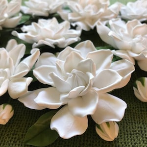 White Gardenia on hair clip with buds and leaves.Wedding on a tropical island.
