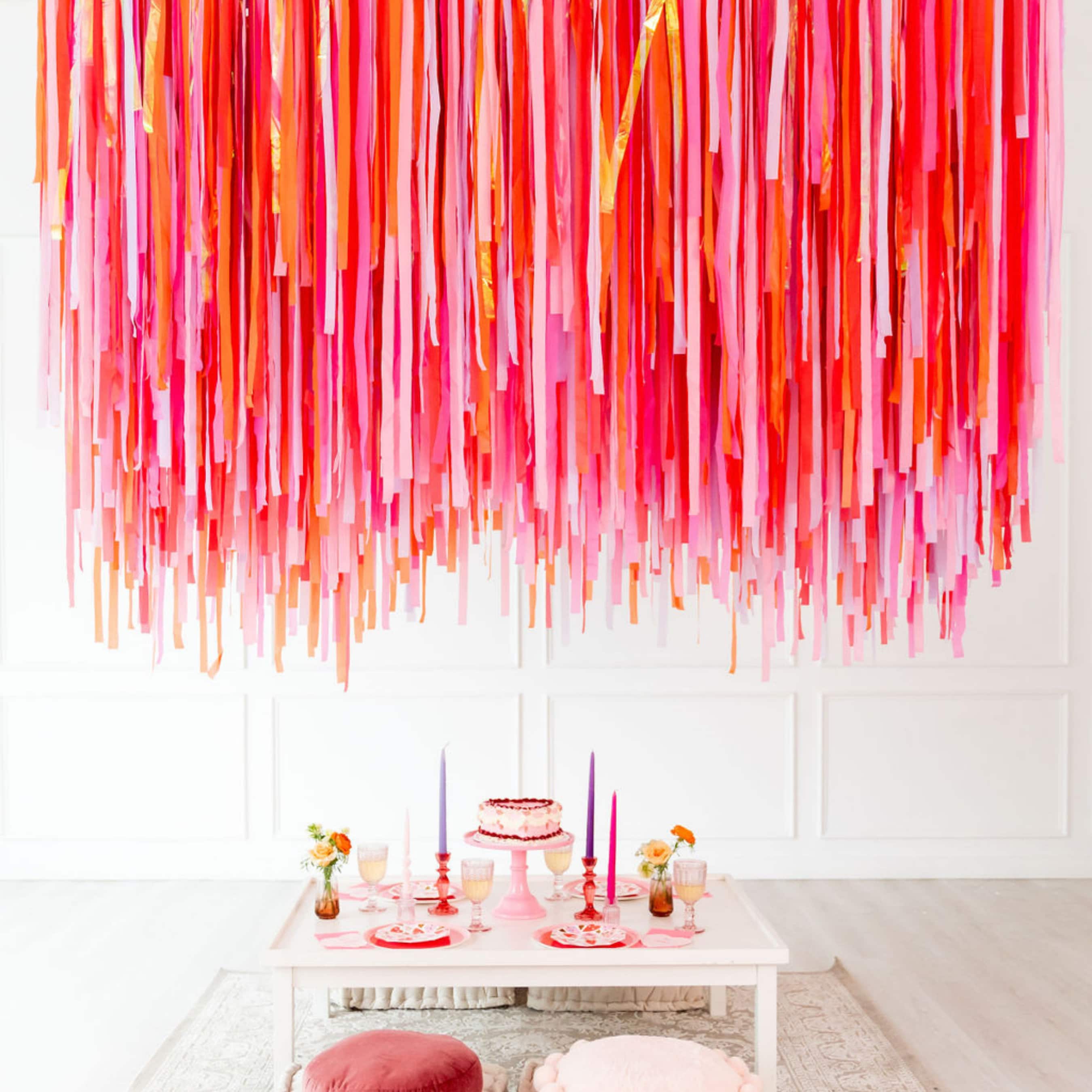 Run two pieces of string across the ceiling and hang streamers (streamers  tied to one, and colle…