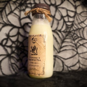 May include: A glass bottle with a brown cork top and a label that reads "Pasteurized Werewolf Milk". The bottle is filled with a pale yellow liquid and is sitting on a black and white patterned surface.