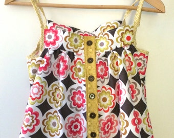 Girls Small/Medium 7/8. Blooms All About! Warm colored red and gold blooms cover this tank top. Ready to ship!