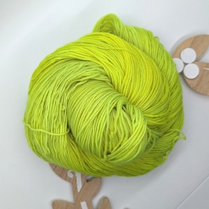 Fingering Weight Sock Yarn / Neon Yellow with Hints of Neon Green (75/25 Superwash Merino Wool/Nylon) Hand Dyed / Textbook
