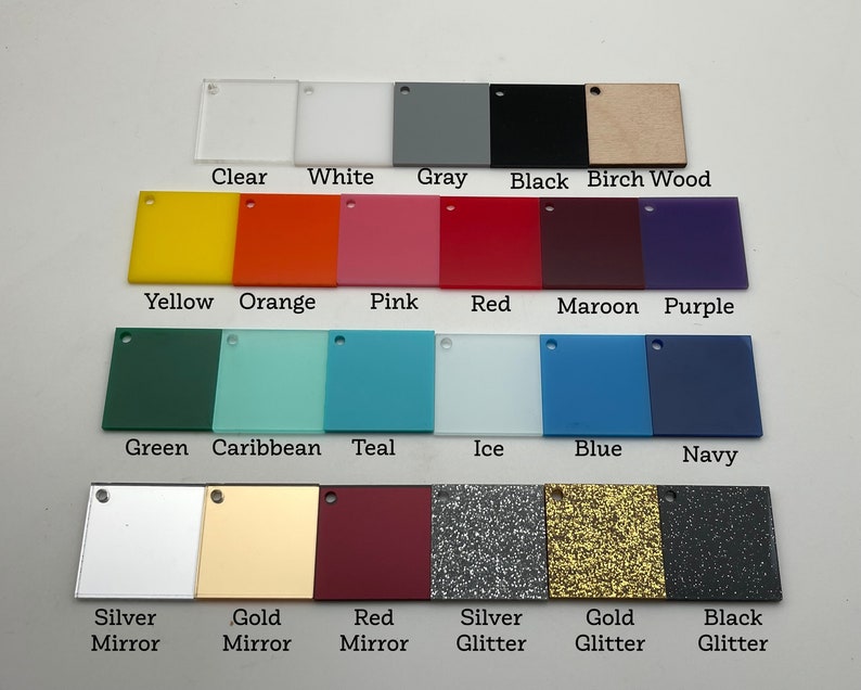 May include: A chart of 20 different colors of acrylic sheets, including clear, white, gray, black, birch wood, yellow, orange, pink, red, maroon, purple, green, Caribbean, teal, ice, blue, navy, silver mirror, gold mirror, red mirror, silver glitter, gold glitter, and black glitter.