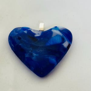 Speckles p of deep blue with white  heart fused glass pendant