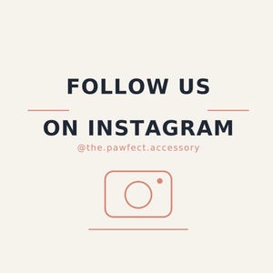 May include: A square graphic with a cream background featuring the dark blue text FOLLOW US ON INSTAGRAM, the handle @the.pawfect.accessory in light pink, and a simple light pink line-art camera icon centered between two horizontal lines.