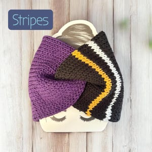Black and purple knit twist headband with gold and white stripe