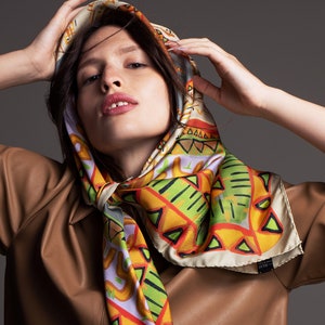 Printed multicolor square silk twill scarf in ,35.5 inch square. Designer scarf by Dikla Levsky. Made in Italy