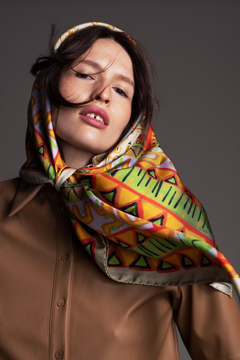 Printed multicolor square silk twill scarf in ,35.5 inch square. Designer scarf by Dikla Levsky. Made in Italy