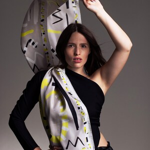 Printed scarf made from light twill silk, Rectangular designer scarf in light grey, white, black and neon yellow. image 2