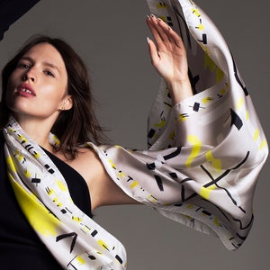 Printed scarf made from light twill silk, Rectangular designer scarf in light grey, white, black and neon yellow. image 1