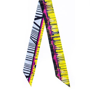 Printed skinny scarf in vibrant colors. Double sided narrow twill silk scarf with bias cut edges. Neon yellow, Pink, Black, Grey. Designer scarf by Dikla Levsky.