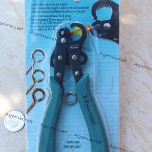 May include: A packet showing a 1-Step Big Looper tool for making eye pins. The tool has black handles with teal grips and is labelled "3.0 mm LOOP". The packaging includes text in English, French, and Spanish, and shows examples of eye pins.