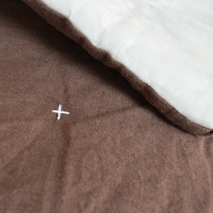 Amore quilt has pure linen on one side and pure cotton on the other side.