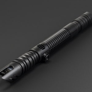 May include: A black lightsaber with a textured grip and a detailed hilt. The lightsaber is made of metal and has a sleek, modern design.