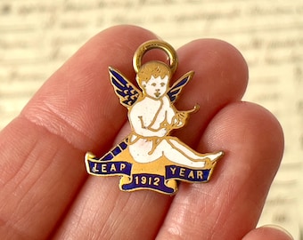 Rare Antique/Vintage Enamel Cherub 'Leap Year 1912' Pendant - Gilt Metal - Circa 1910's.