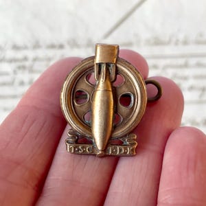 Vintage WWII Technical Services Corps South Africa Uniform/Cap Badge - Brass With Lugs - Circa 1940's.