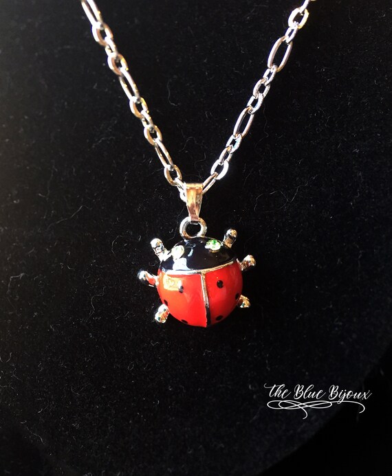 925 Sterling Silver White & Red Enamel Ladybug Baby Shoe CZ Charm Pendant 925 Sterling Silver White & Red Enamel Ladybug Baby Shoe CZ Charm Pendant