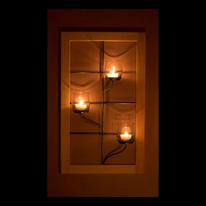 Window frame wall sconce with vase style glass votive holders