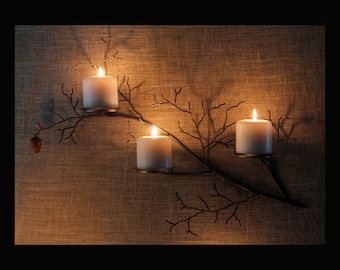 left hand metal  tree branch sculpture wall sconce with hand turned acorn for votive and pillar candles